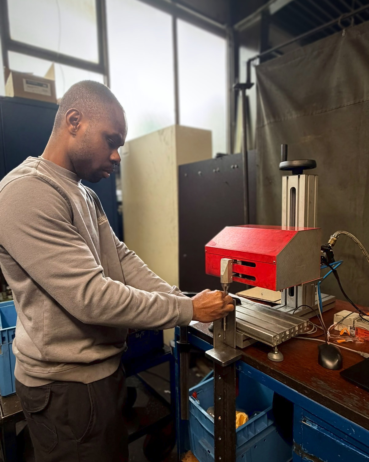 Princewell Isiodu marking a component on the marking machine